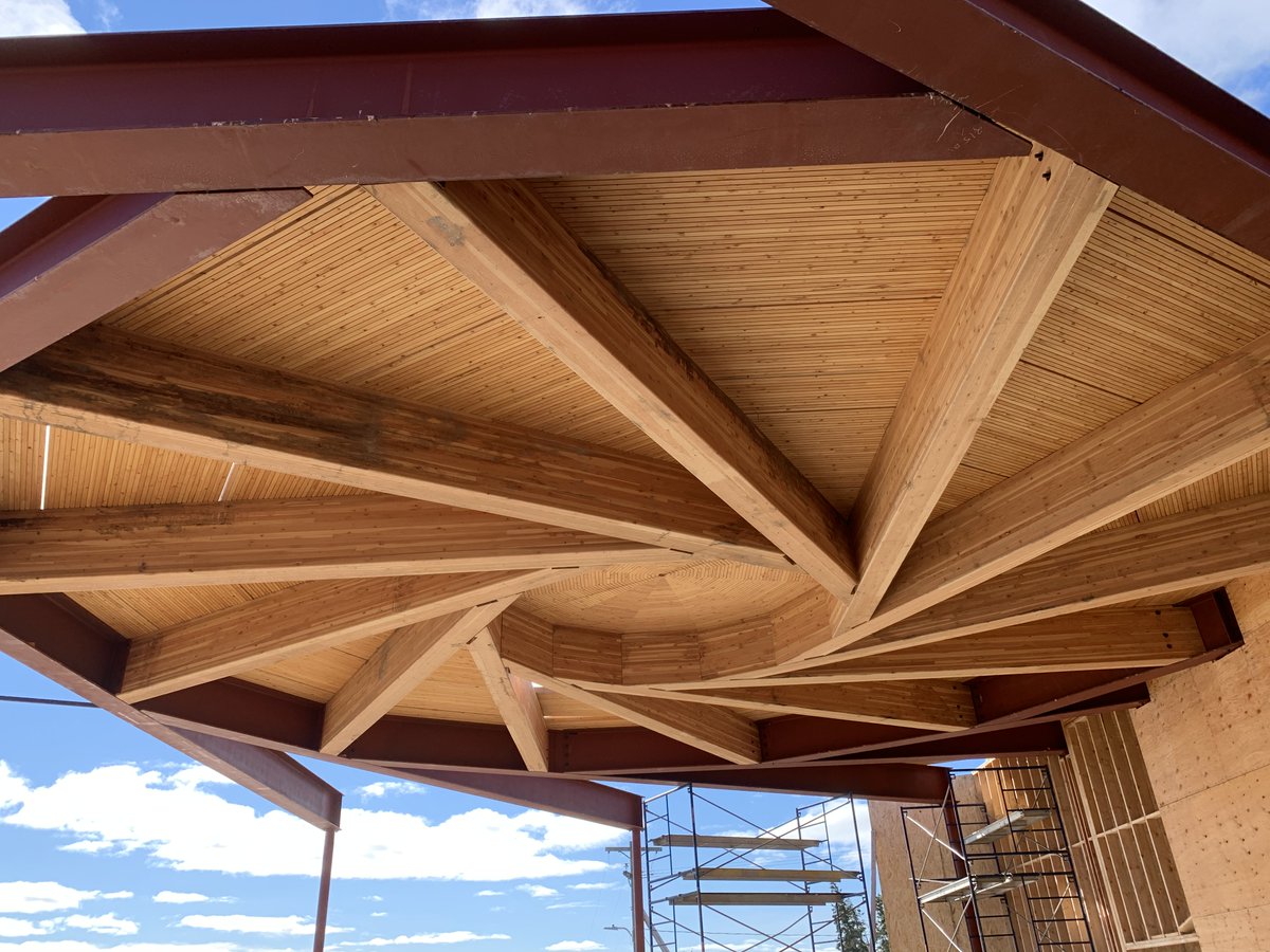 We have recently hit a couple major milestones on the construction of the Old Crow Community Centre in Old Crow, YT. Assembled from glulam beams and DLT (Dowel Laminated Timber) panels, the "eye" structure is one of the distinguishing features of this unique project.