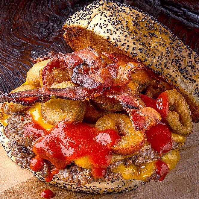 Our September Burger is Hot!!!! Enjoy our popular Firetruck Burger all month- double meat, Chipotle Cheddar cheese, jalapeño bacon, Jakes’ Hangover sauce, pico de gallo &amp; fried jalapeño bottle caps! #bestburger #burgerofthemonth #september #jalapeños