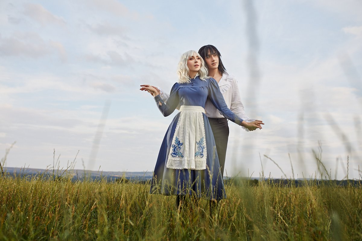 azproductioncos's tweet photo. Do you remember the ending scene from Howl's Moving Castle where Howl and Sophie stay in a field holding hands? It was the key idea for the second part of our photoshoot. Howl and Sophie by @NikitaCosplay and @blondecay Assistant @SPhotography_b #ghibli #cosplay https://t.co/YcfVnxlgIF