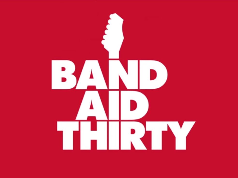 Band Aid - a charity supergroup featuring mainly British and Irish musicians and recording artists. The lads were involved in the 2014 incarnation of the charity supergroup Band Aid. The focus was to raise money to help prevent the Ebola crisis in Western Africa spreading.