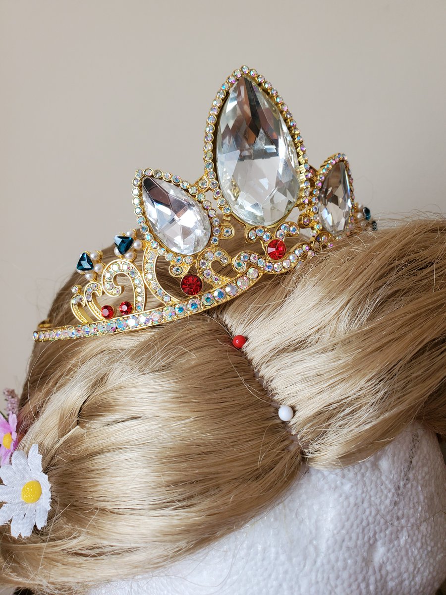 Finally took the plunge and bought Rapunzels tiara! Found a replica I really liked that wasn't over $100! People always ask if I have the tiara with me when I cosplay Eugene so now I can say I do! Tiara by: Royal Enchantments ( https://royalenchantments.com/ )