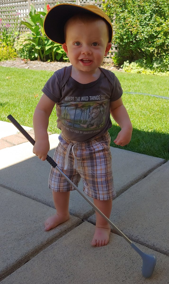 The boy has been grown into a golfer man.