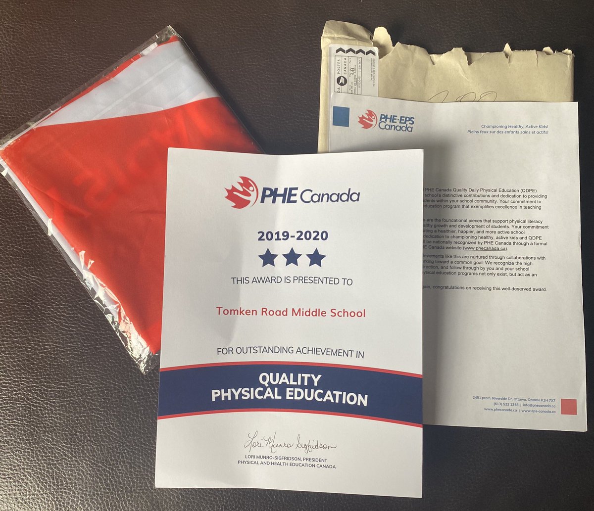 Better late than never. Due to school closures in the spring our <a href="/PHECanada/">PHE Canada | EPS Canada</a> award never found it’s way home. We have it now <a href="/TomkenPHE/">Tomken PHE</a> ! Looking forward to the day we can present it to the kids who earned it <a href="/tomkenroadms/">Tomken Road Middle School</a> 🐯 <a href="/PeelSchools/">Peel District School Board</a> <a href="/hpe4pdsb/">HPE, PDSB</a> <a href="/paul_dasilva12/">Paul da Silva</a>