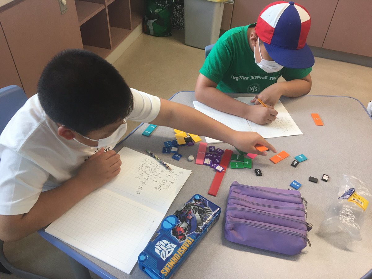 NISGrade4's tweet image. Adding fractions of unlike denominators: how does that actually look like? Let’s model it! #NISinquire #pypmath