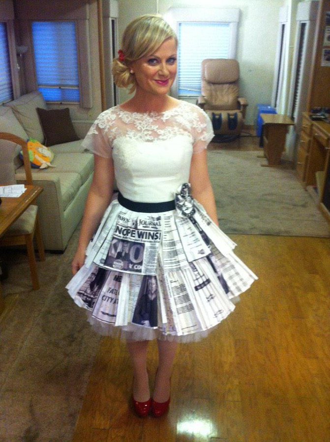 I’m just gonna go through the Leslie photos I have on my phone.Third one it’s not really Leslie but she’s with the dress so I’m counting.