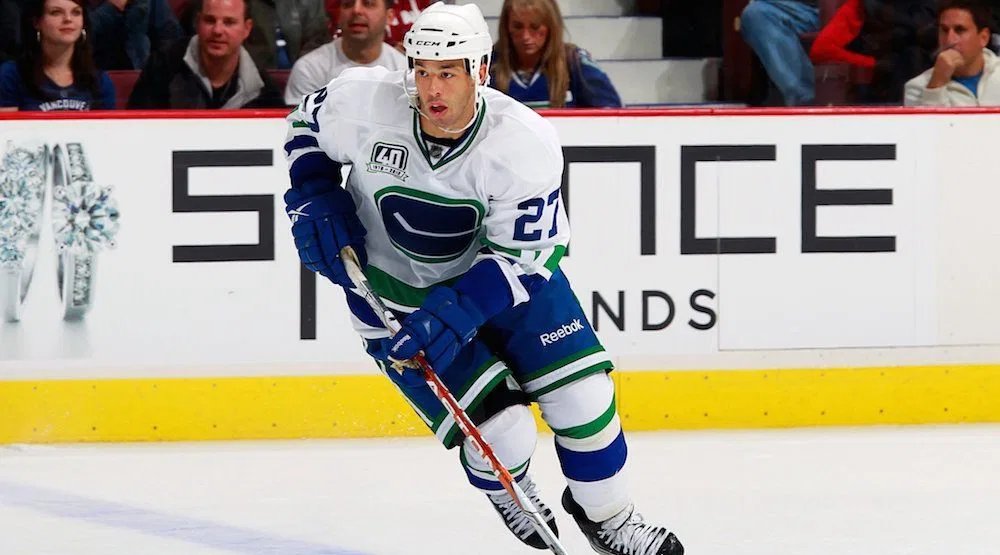 Manny Malhotra, CANUCKS LEGEND. Faceoff god. Center, of Indian descent! Drafted 7th overall by the Rangers in 1998. Killer two-way forward! He's now an assistant coach with the Canucks and we love him here 