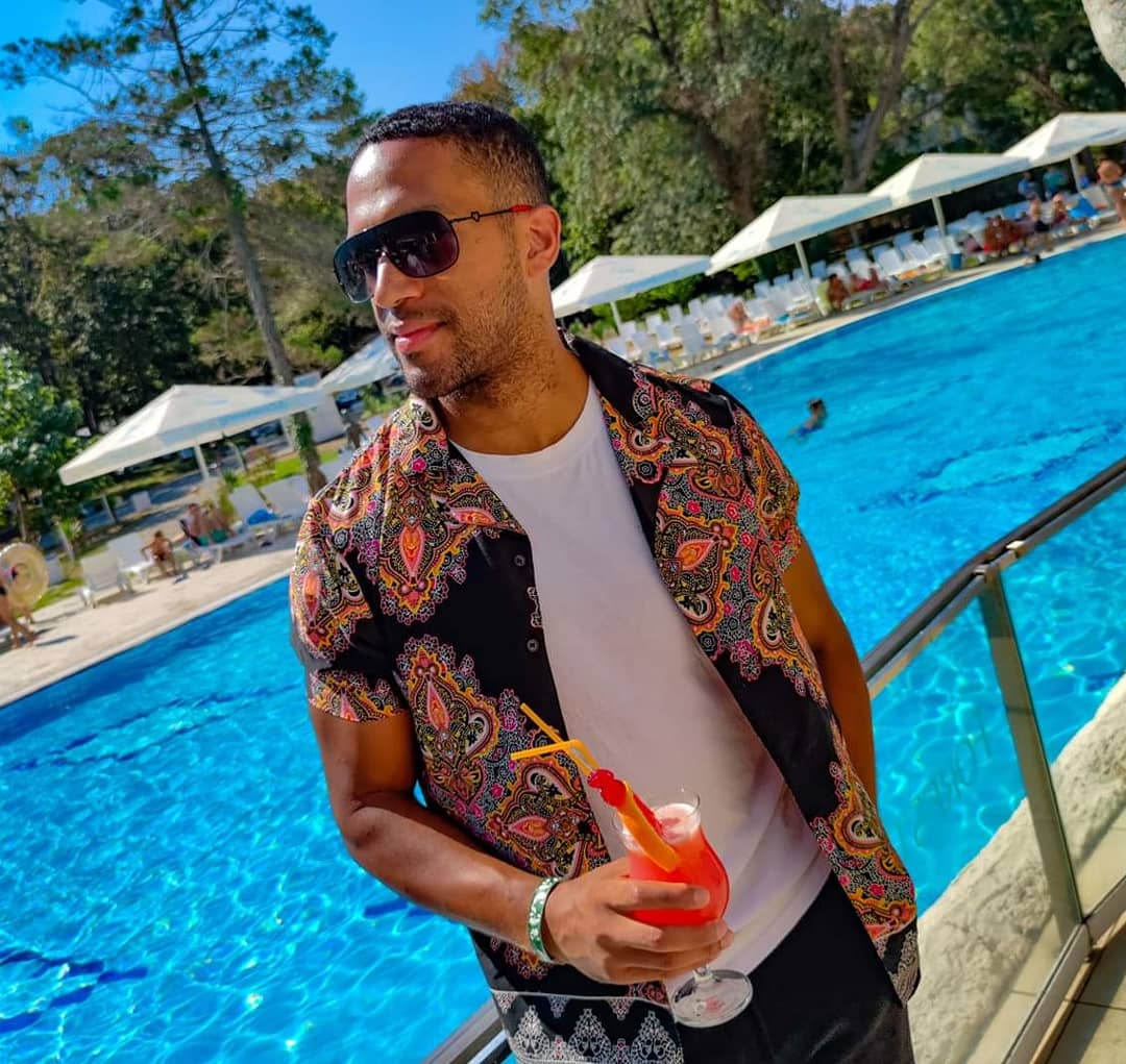 EurovisionCamp's tweet photo. #Austria's @CesarSampson_ enjoying a refreshing cocktail at the Forest Beach pool before he takes the #iCardMusicChallenge 🍹 He challenged Josh Stanley from #Monaco. What are your questions for him regarding songwriting? #BSESC2020 https://t.co/okhXjOUUus