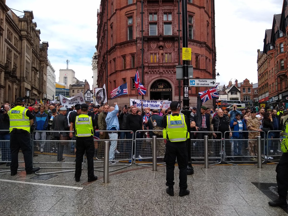 Large crowd of far-right now in King/Queen Streets.Lots of England flags and a sign saying "pizzagate is real"