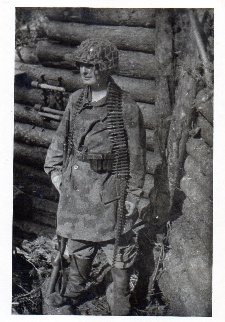 Seeming Luftwaffen Feld Divisionen member, wearing a Splittertarn 3/4 Field jacket. Their formation means we can date from autumn 1942+. A year later they were under Heer command. Note the internal racking of a Stielhandgranate box fixed to the right of the embrasure. 26)