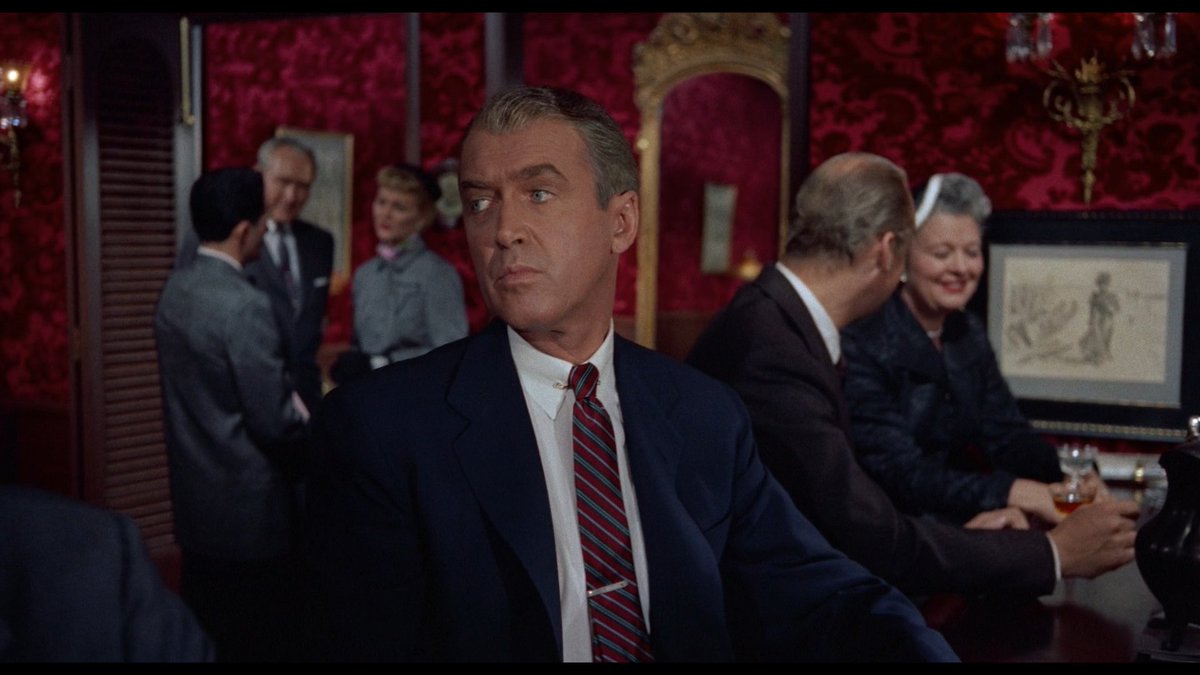 genuinely a v nice movement. obviously yes yes the strength of the crimson walls and all that psychosexual connotation to emphasise the brilliance of the green dress but this kind of specific-general-specific movement in a single shot makes any story feel much bigger than it is