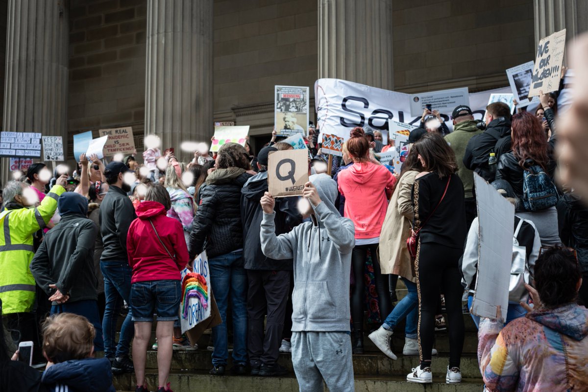 Liverpool: "A few hundred people at the event. The wearing of masks was openly discouraged and I was watched closely by many for wearing one. Lots of people had QAnon placards and the use of hashtags associated with it was rife. The word scamdemic was said to me several times"
