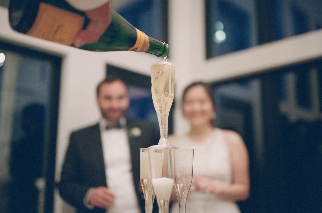 A different perspective to the champagne pour that I just adore! 

#film #filmphotographer #whiterabbitstudios #wedding #35mm #alabama #alabamawedding #southernweddingphotographer #southernweddings #filmisnotdead #kodakmoments #richardphotolab #weddingphotographer #lakeguntersvil