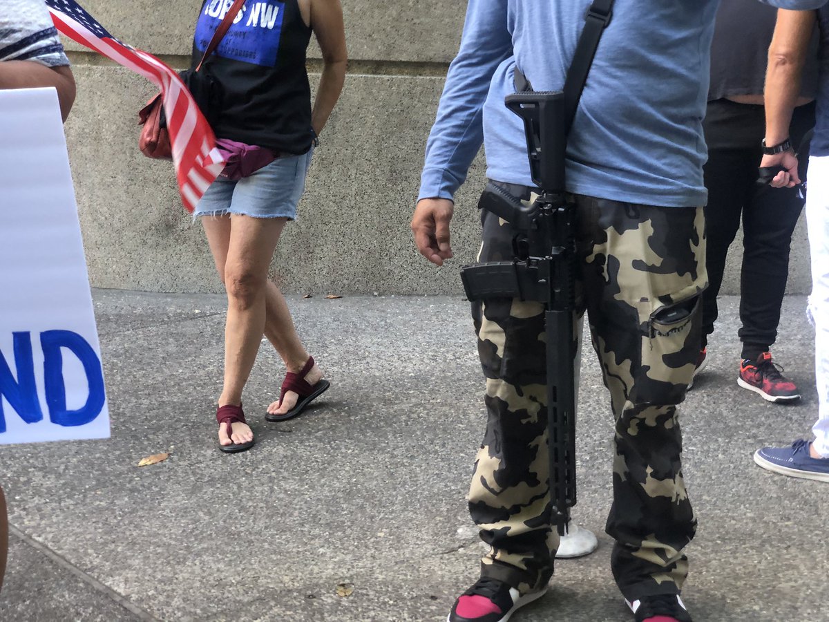 Firearms on display from the pro police and Trump group.