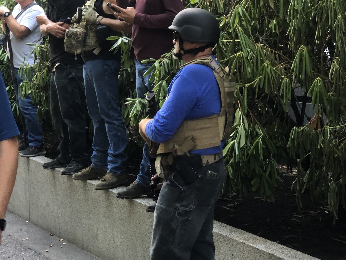 Firearms on display from the pro police and Trump group.