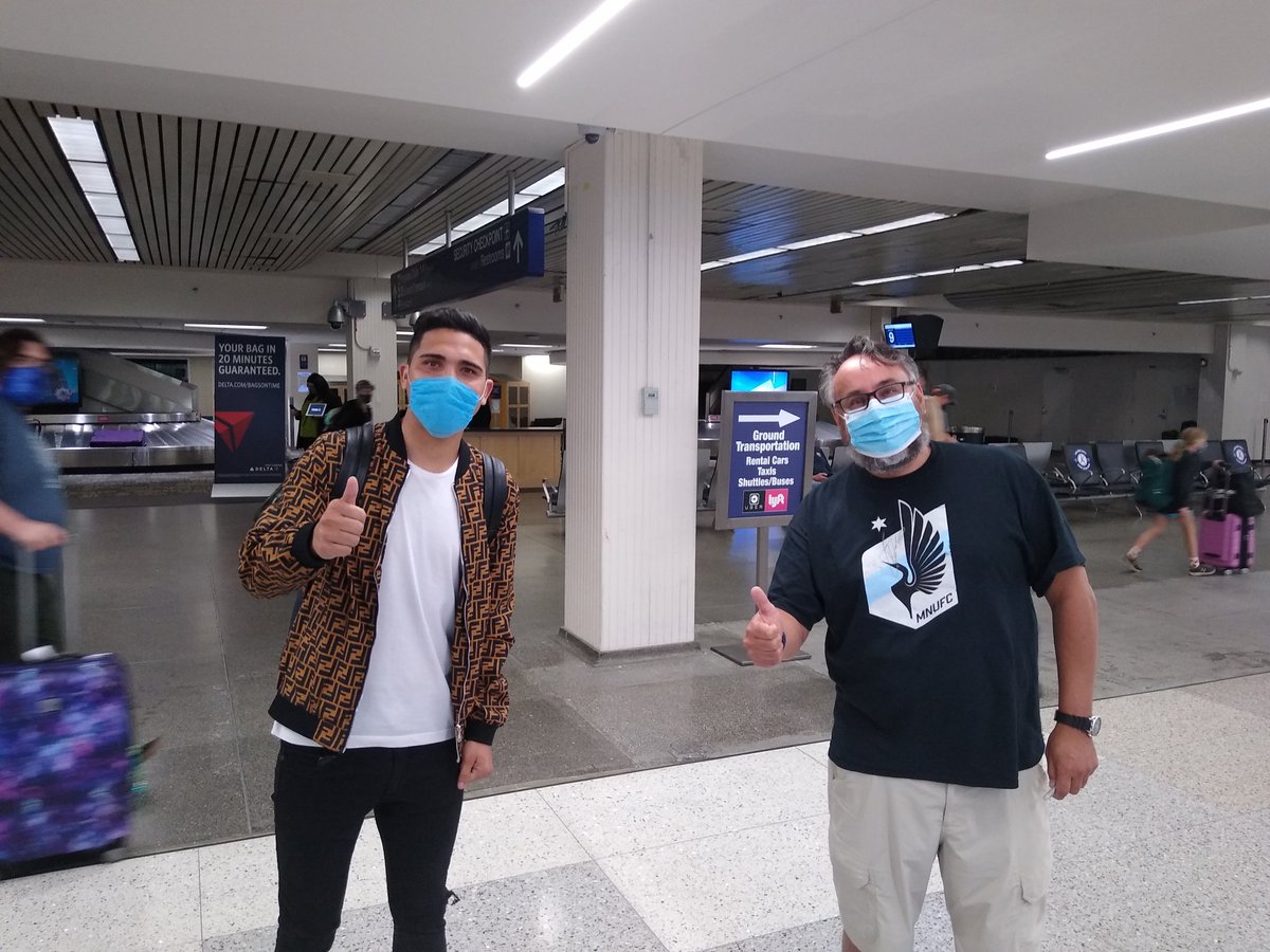 JCinMSP's tweet photo. #MNUFC Twitter, I can confirm that Emanuel Reynoso has arrived at MSP airport from Boca Juniors and Argentina! Welcome to Minnesota Bebelo! https://t.co/mXYb7XVhHv