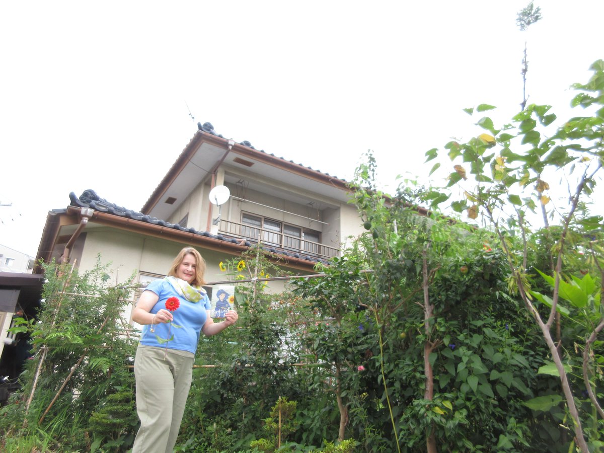 2. I went out this morning to go to the place where I saw tall sunflowers--but they'd dried up. But I biked on and discovered an absolutely beautiful garden. The man there was so proud and he cut the red flower for me!