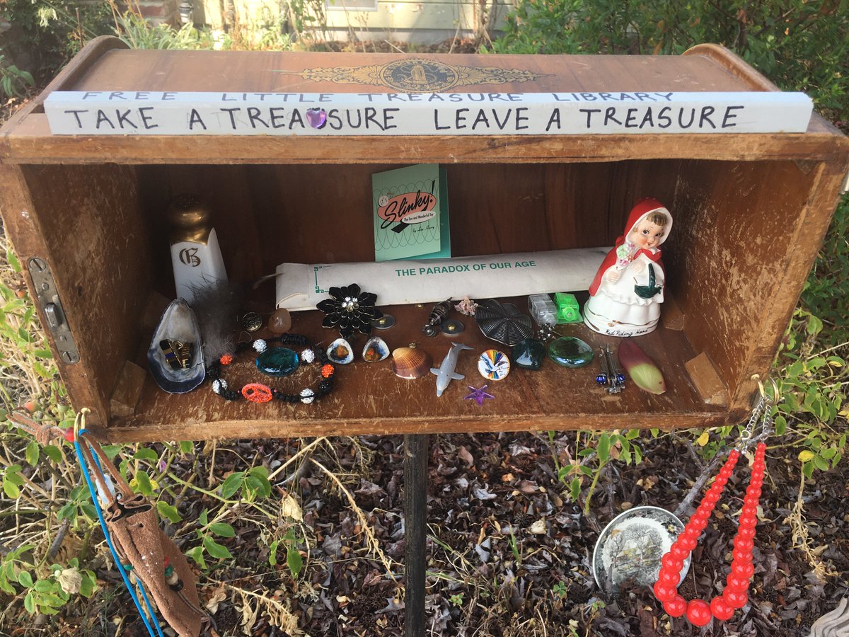 Inspired by the free little library project I made a Free Little Treasure Library. Take a treasure. Leave a treasure.