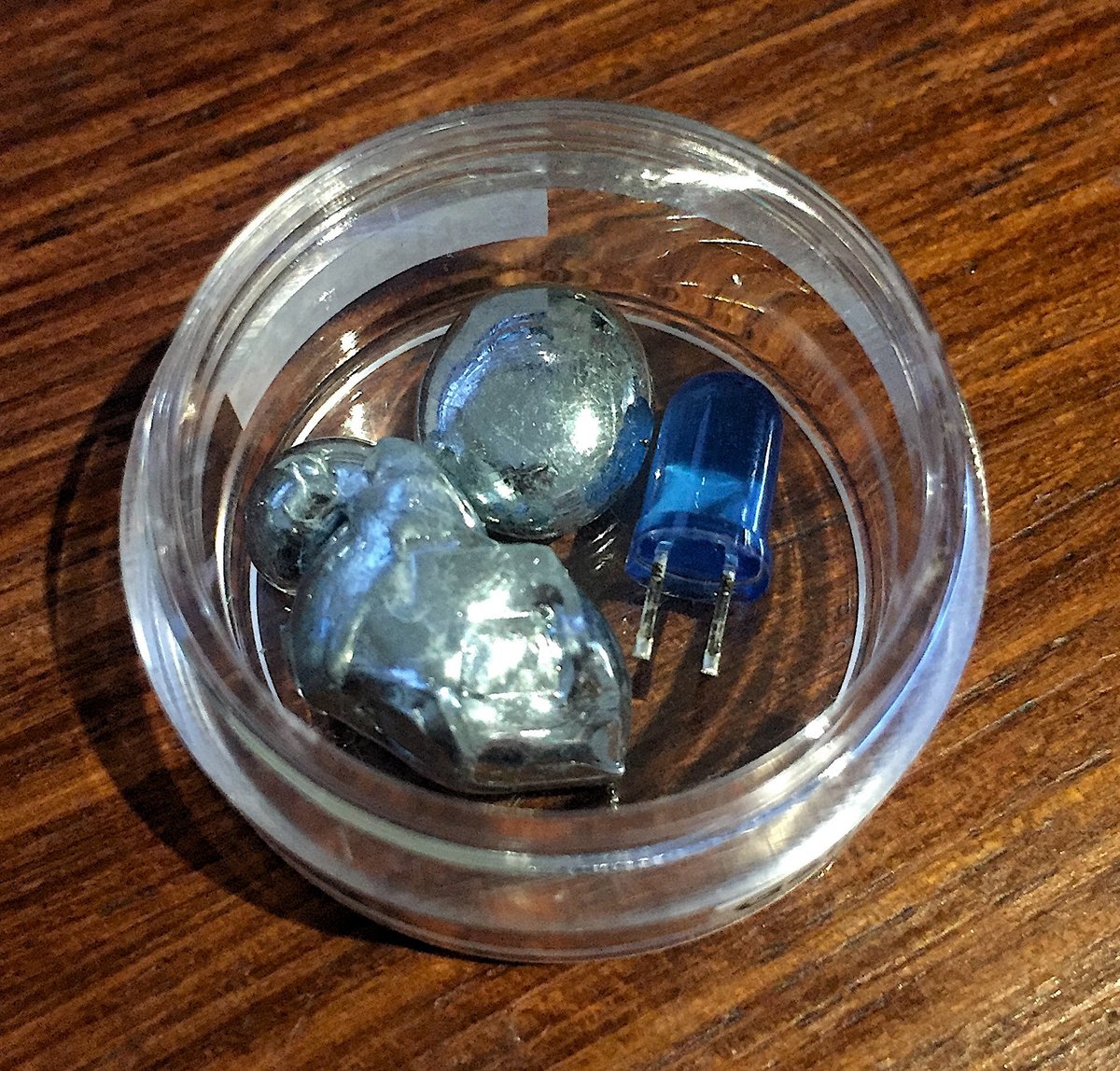 Gallium  #elementphotos, including a gallium nitride (GaN) Blue LED. Unlike M&Ms, gallium will melt in your hand (m.p. 29.76 °C).