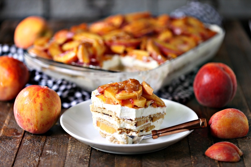 Peaches are already such a treat, add them to this peach icebox cake and you've got a little piece of heaven! Grab a container of peaches next time you're at the grocery store and enjoy! Recipe courtesy of Kim from Cravings of a Lunatic. bit.ly/2H2Qvwb @OntTenderFruit