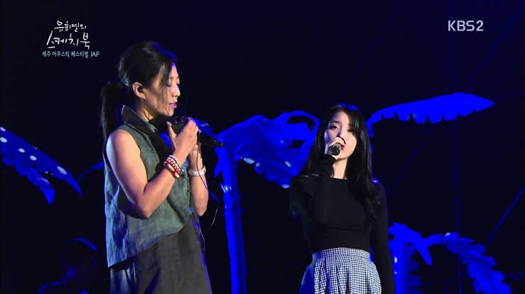 “ #IU works hard, is talented and well loved by many. Through performing together (in YHY Sketchbook), we got closer to each other. I really like “Through the Night”, & I appreciate it even more after knowing she wrote the lyrics to that song herself.”- Jang Pilsun