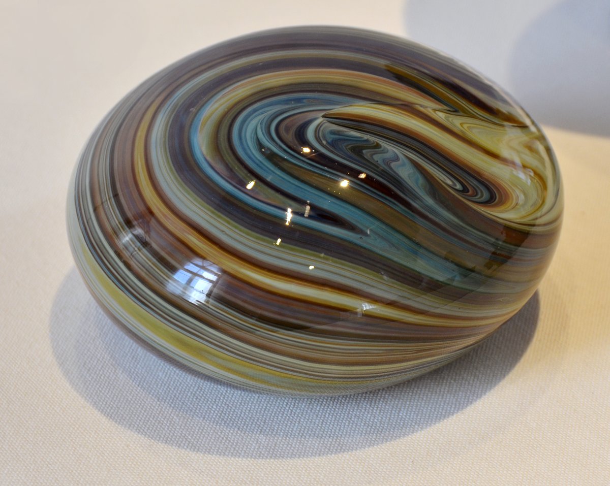 Calcedonio glass is marbled, and looks like chalcedony.This picture is a 19th century example, but the technique was invented in 14th century.