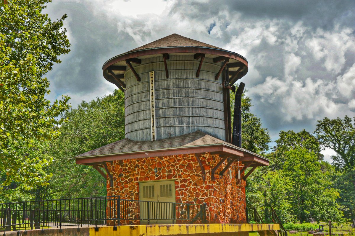 TexasStateRR's tweet photo. "Water stops", like this tower at our #Rusk depot, were ubiquitous throughout the U.S., feeding steam engine boilers along tracks nationwide. In 2020, they've become rarer than hens' teeth. Join us for a ride aboard #TexasStateRR and keep this rail history alive. https://t.co/KPyPDgC68X