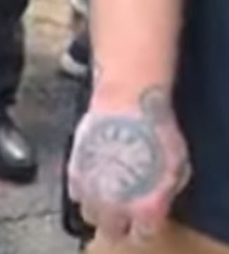 A few details on the Trump protester who broke  @IwriteOK's finger --Distinct moles / birthmarks on his faceMultiple tattoos on his hand/forearm, including letters on his right hand and a pocket watch on the top of his hand