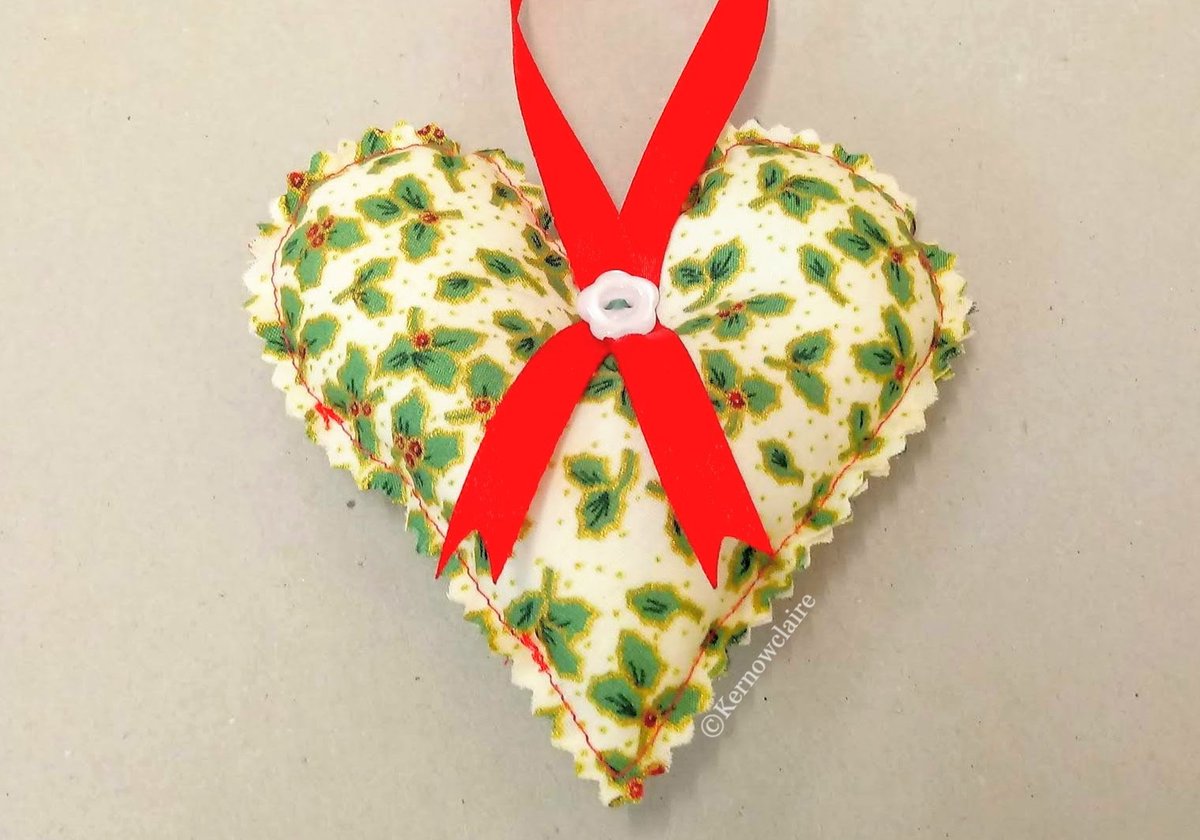kernowclaire1's tweet photo. Christmas heart in white with holly pattern, gold spots and red hanging ribbon. Lovely decoration for Christmas #handmadeintheuk #giftforher #christmas #hangingheart #fabricheart #SmallBusiness #handmadehour https://t.co/NarPprhadT https://t.co/bnS0vKCyZR