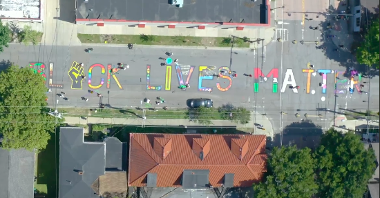downtownithaca's tweet photo. Our community now has its own Black Lives Matter mural! Check it out at the intersection of Plain St. and MLK Jr. Street! Video captured by Shira Golding Evergreen, a local filmmaker. #DowntownIthaca #IthacaNY #BlackLivesMatter #IthacaMurals #ILOVENY 
https://t.co/CNmwMpI1UT https://t.co/lcNVjE6KUD