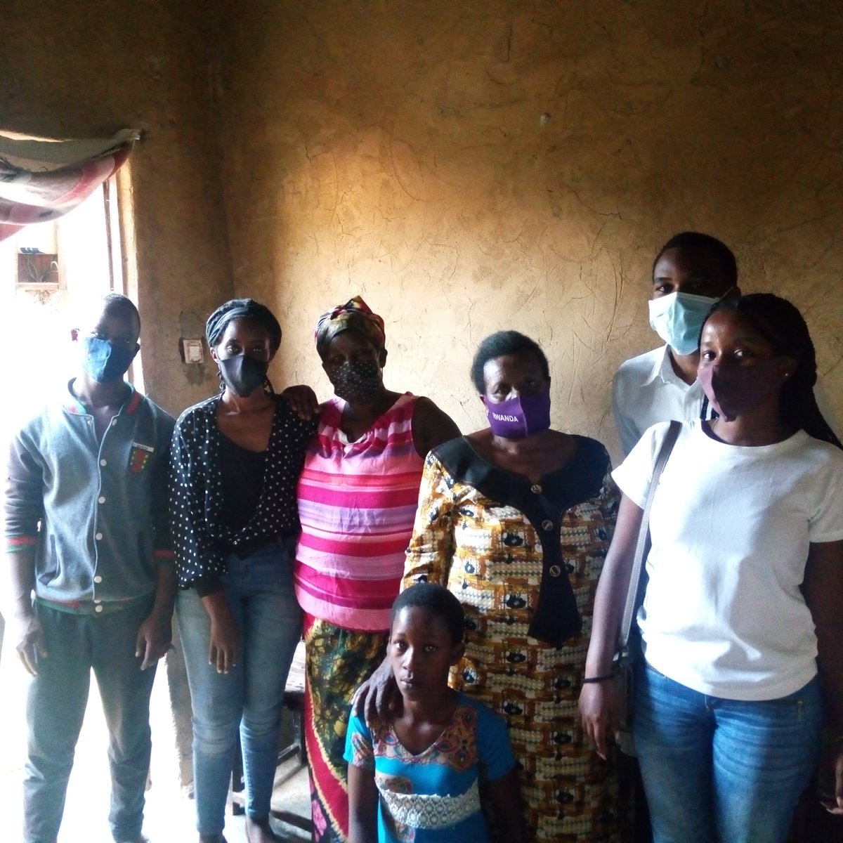 JRYCRwanda's tweet photo. JRYC Rwandan side at Odette's house(3rd from left) handing her food fund as a support to her poor family. @JRYCRwanda @japanrwanda #WeForThePoor https://t.co/EeHz2R6Z9W