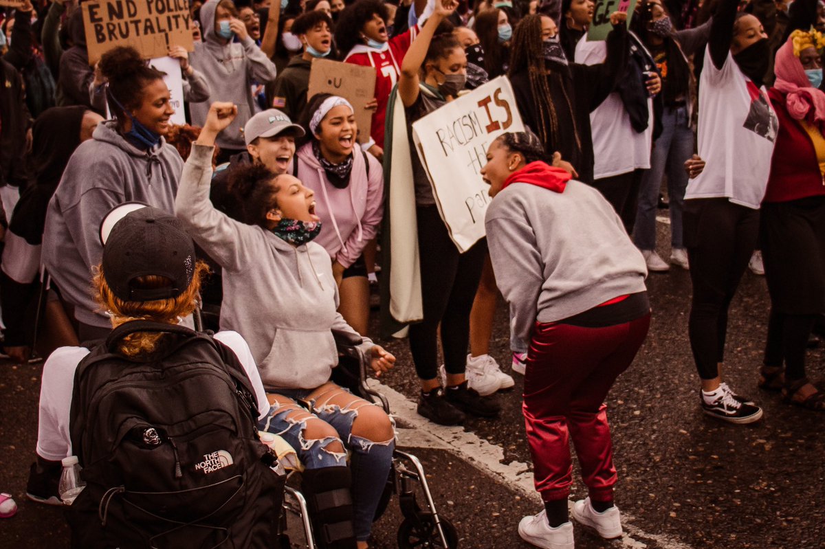 Moments by Mariah Photography. A black woman photographer based in Portland, OR. A photojournalist and lifestyle photographer.