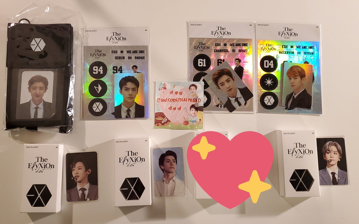 WTS EXO CHANYEOL SEHUN BAEKHYUN ELYXION GOODS MERCH chanyeol ticket holder $30 hologram deco sticker+ pc set $15 each voice key ring + photocard $25 each** have 2 baekhyun voice key ring but no pc for $13 shipped each