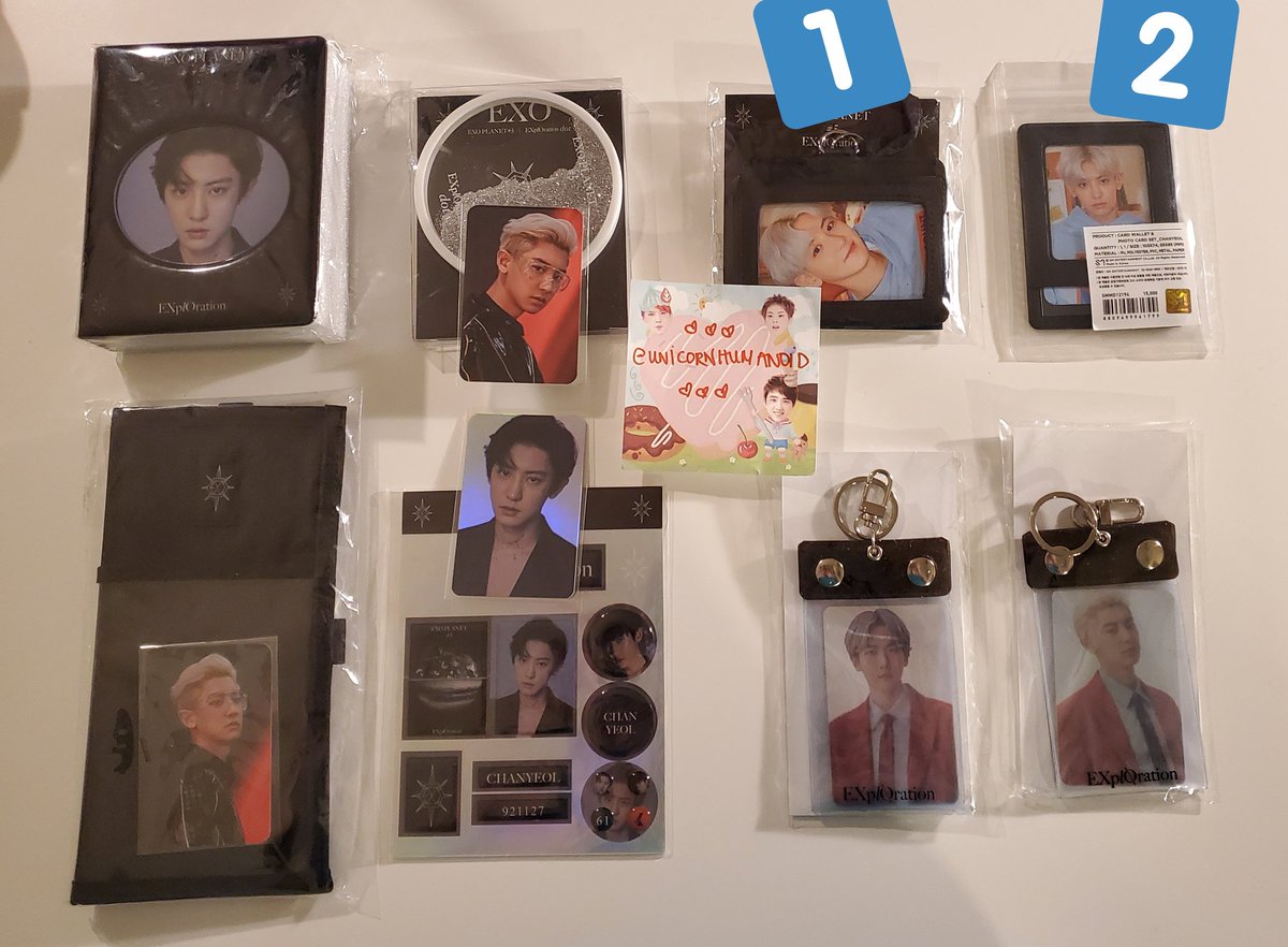 WTS EXO CHANYEOL EXPLORATION DOT 5 GOODS WITH PCs chanyeol photocard collect book $18 ticket holder set $30 coaster set $16 epoxy holo sticker pc set $16 card wallet set #1 $23 card wallet set $2 $18 baekhyun / chanyeol hologram key chain sets $15 each