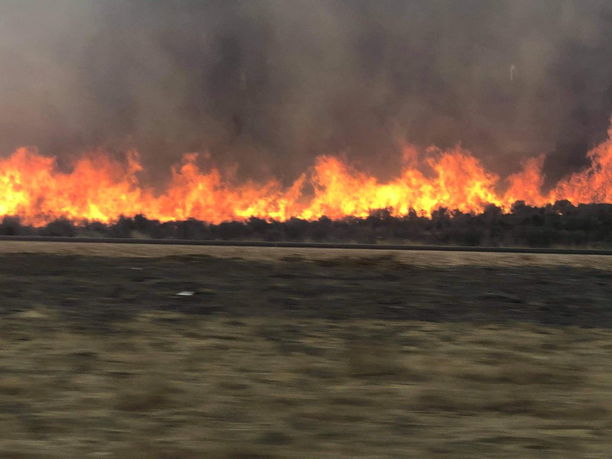 brian_schnee's tweet photo. These photos were sent in by a driver on I-15.
Hearing from nearby resident that firefighters have a good handle on it.
#BenchFire | @UtahWildfire | @fox13 https://t.co/67S023sA9M
