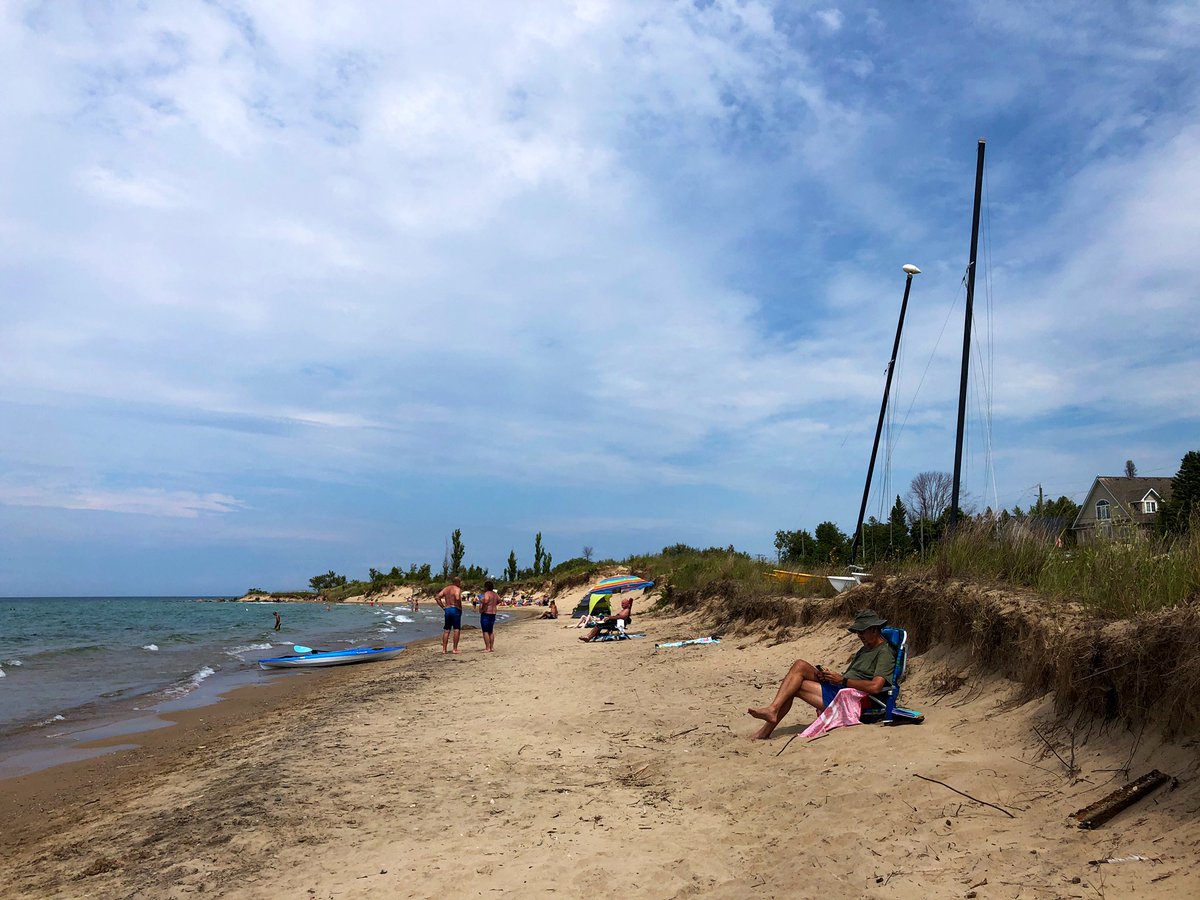 Good chop on the ocean today. You can swim in it up and down the coast for a half hour and feel your skin glowing warm from the sun on the drive back to the city across the middle of Lower Ontario. All is also well on the beach here too.