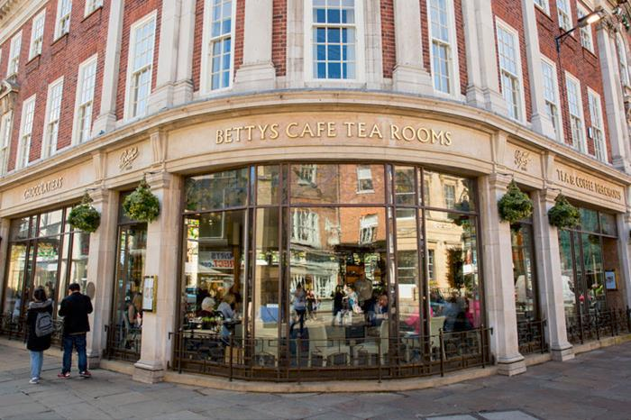 Bettys - an enduring icon of 20th Century York, serving that most British of treats - the afternoon tea - was actually founded by an immigrant from Switzerland. Frederick Belmont, arrived in England in 1919, speaking very little English and headed to Yorkshire almost by chance.
