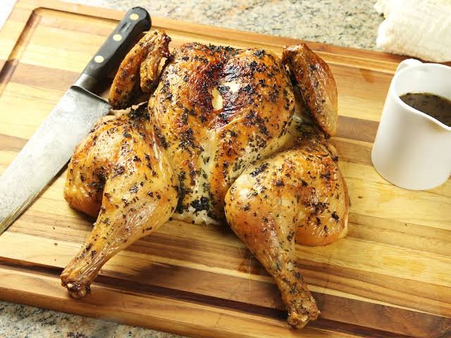 To butterfly a chicken you take really strong kitchen scissors and cut down the back bone of the chicken. You can do it with a strong knife as well but people tend to make a mess of that, kitchen scissors are best.Makes it easier to season the chicken as well. 