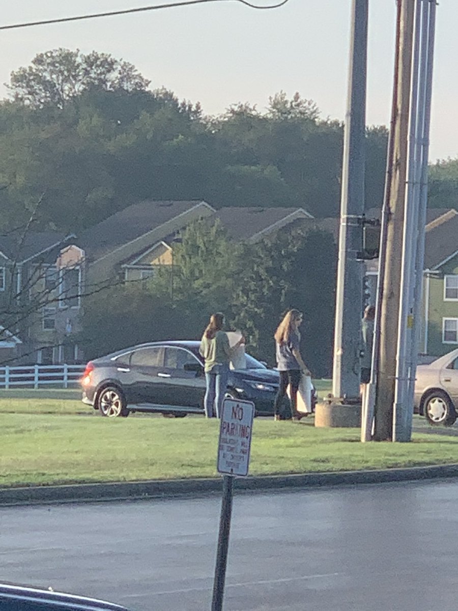 BGISDgaryfields's tweet photo. That uncertain feeling when you think there are protestors against school reopening @BGJHS on first day of school. Then you realize they are holding signs that say welcome back and honk if you are excited for school. 3 college age kids give me hope. https://t.co/b6UQTC3T6v