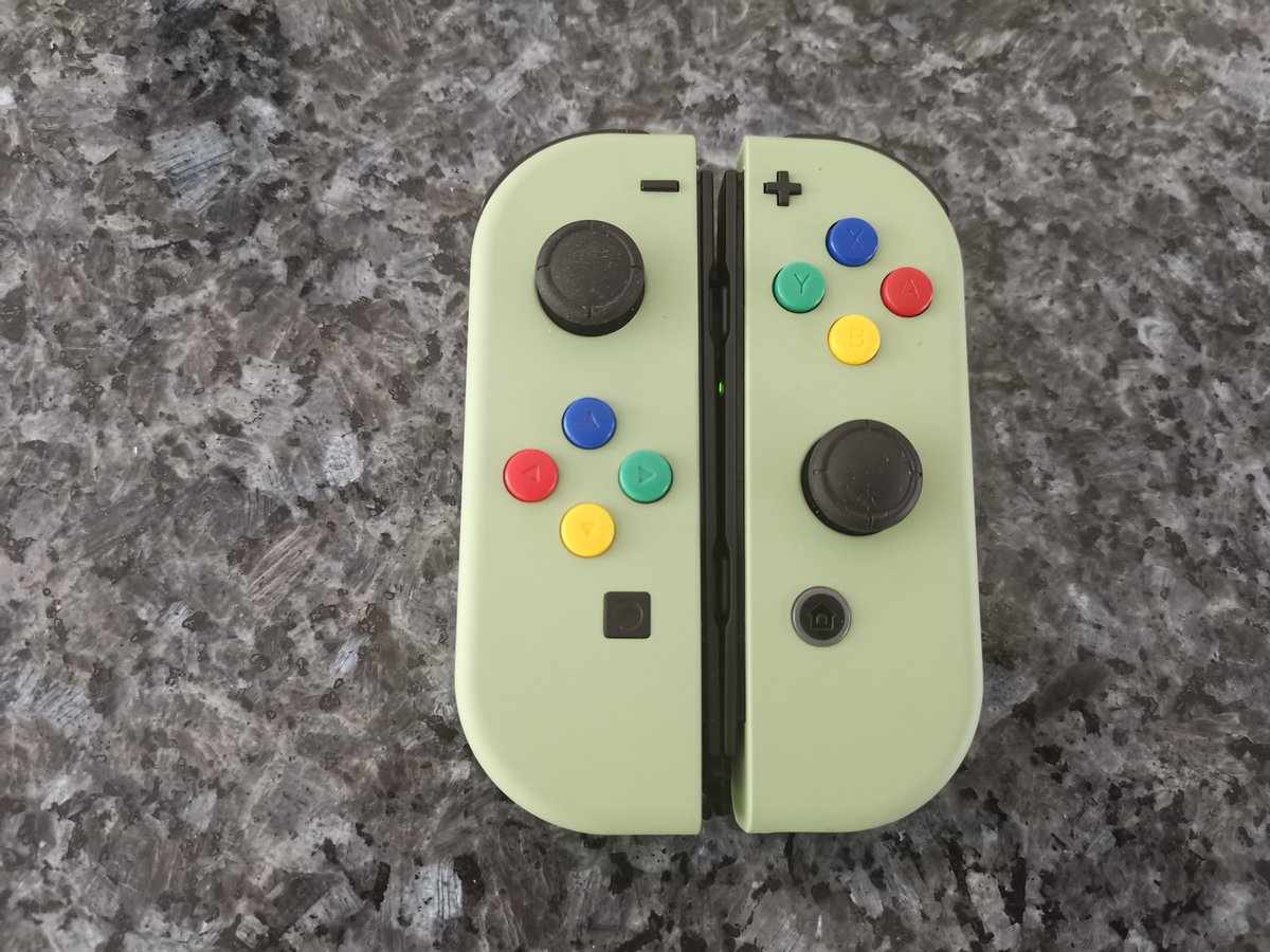 Arceus_90's tweet photo. Finally took the time installing my mint green joycon shells. They look so nice. @SerfectPcore &amp; @ExtremeRate https://t.co/5K1opHP0Ii