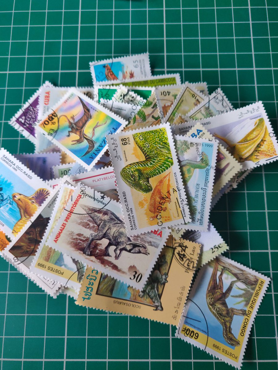 I bought a bag o' stamps that feature prehistoric beasts (mainly very cursed dinosaurs) from postal systems all around the world and I've picked the best ones to help put a smile on your face today!