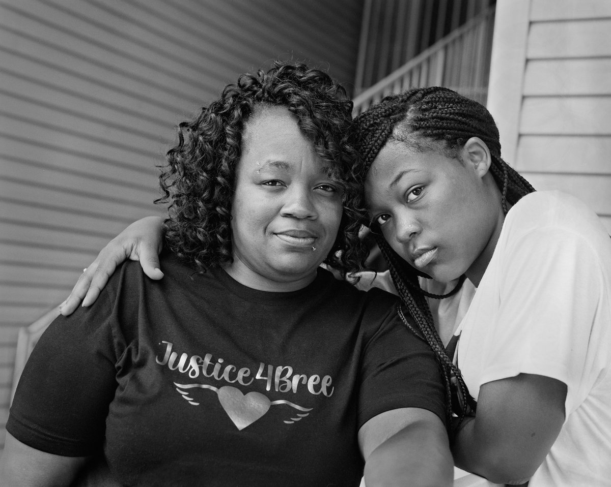 Breonna Taylor’s Mother, Tamika Palmer, and Sister, Juniyah Palmer, Standing at the Banister Where Breonna Once Stood, Near the Front Steps of Her Apartment on Springfield Drive in Louisville, Kentucky.Photograph by LaToya Ruby Frazier.  http://vntyfr.com/FbVGT9U 