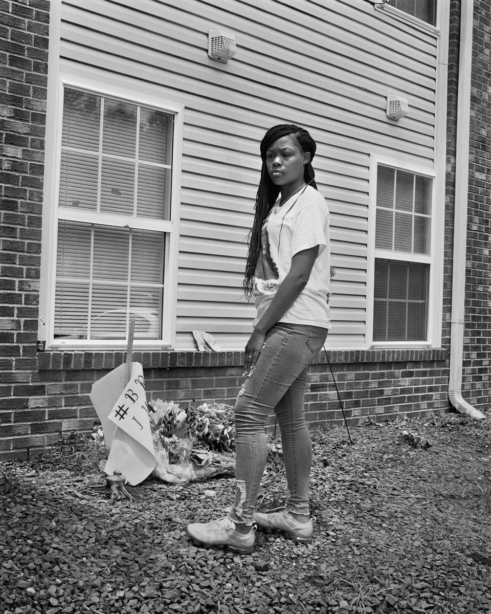 Breonna Taylor’s Sister, Juniyah Palmer, Standing Between the Two Front Bedroom Windows of the Apartment Where the Louisville Metro Police Department Fired Over 20 Bullets on March 13th, Just After 12:30 a.m. on Springfield Drive, Louisville, Kentucky. http://vntyfr.com/FbVGT9U 