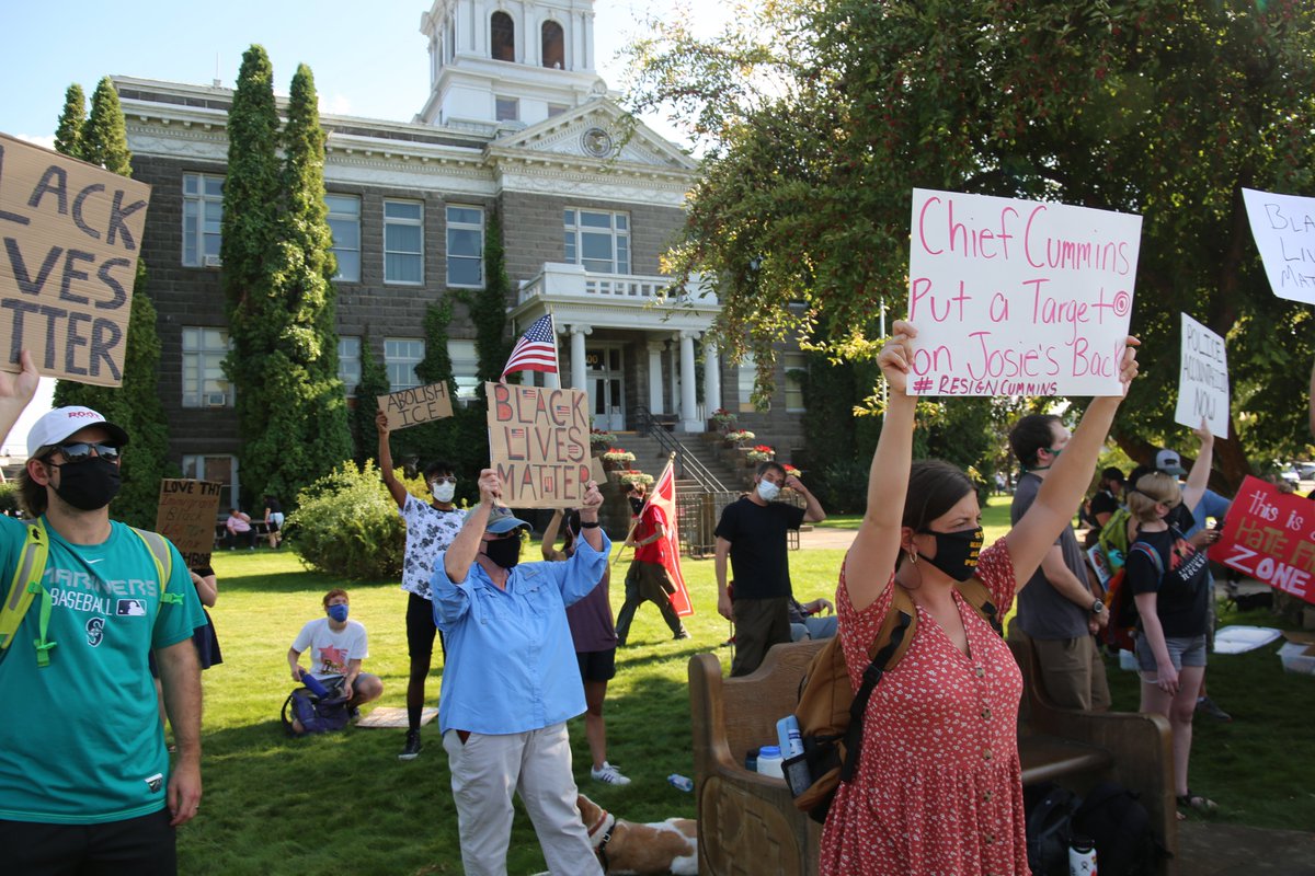 on Aug. 15 people on one side of the road held handmade cardboard signs supportive of Black Lives Matter, or Stanfield specifically. They chanted: “No justice, no peace,” and “Say their names.”