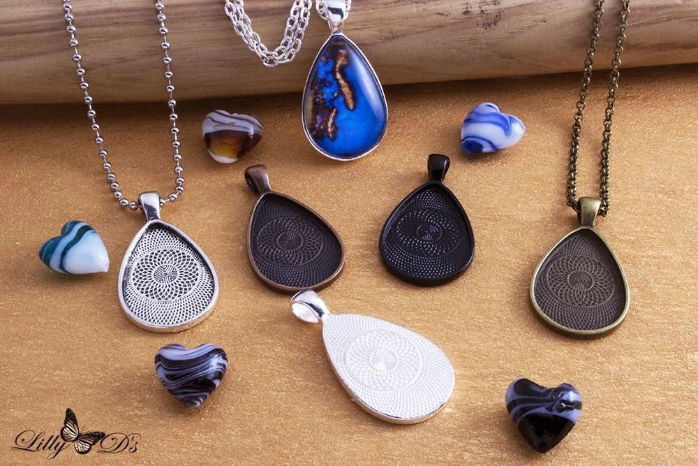 The tear drop ones are awesome, too. <3  https://www.lillyds.com/products/20x30mm-tear-drop-photo-pendant-tray-kit?variant=6939683717