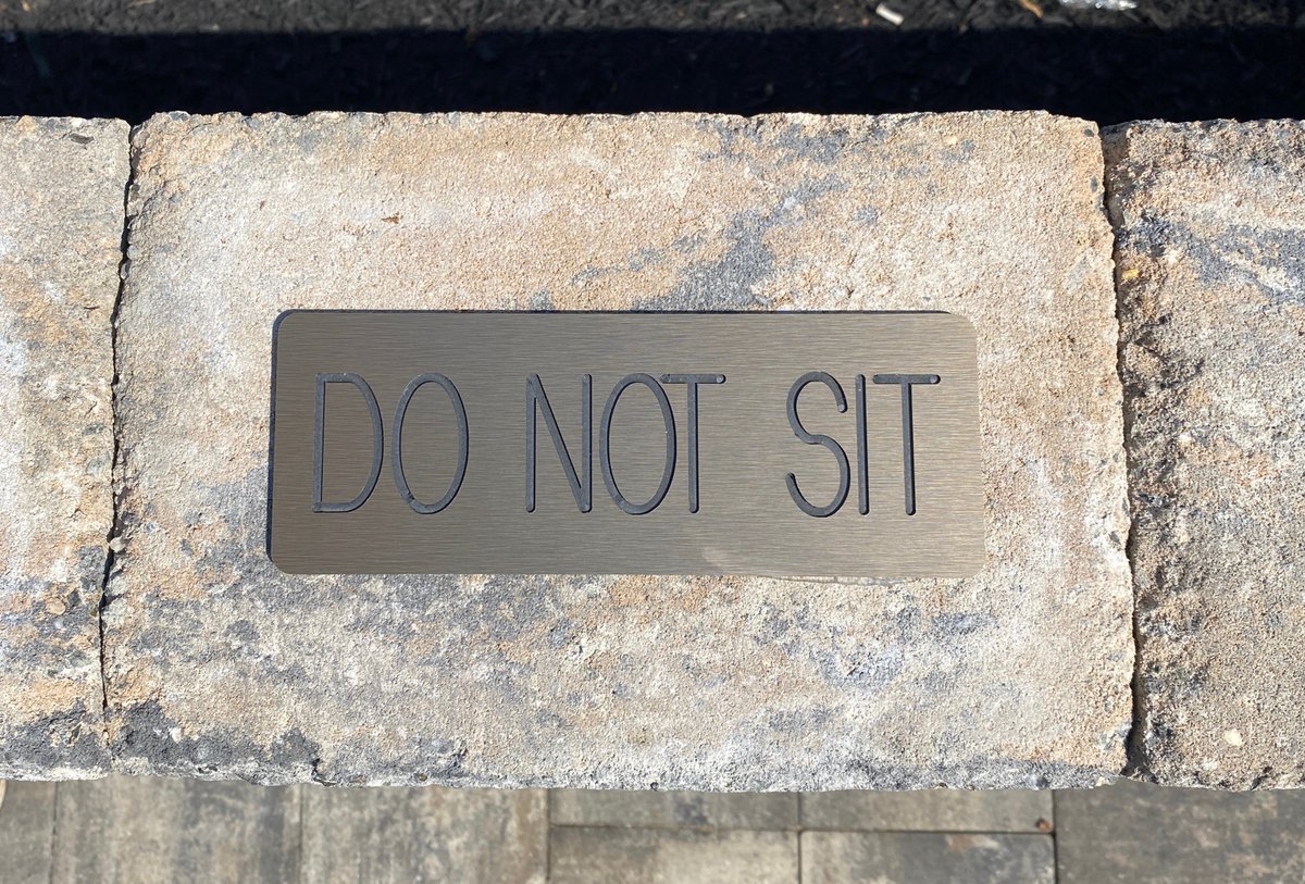 artpartssigns's tweet photo. These custom “Do not sit” signs were cnc routed and installed the railing for @Cobblestone_ccc. 20 3x8 inch signs were carved and placed along the stone ledge. The brushed bronze looks great against the stone bricks and the course looks beautiful as always! #signs #signsoftwitter https://t.co/awidGksiCm
