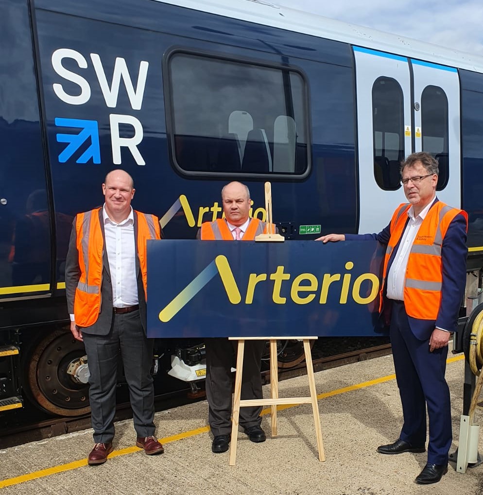 SW_Help's tweet photo. @LondonWaterloo @BombardierR_UK The new name was announced by Managing Director Mark Hopwood at our Wimbledon depot today. 

Mark announced the new name along with Steve Dodd (Commercial Director, Rock Rail) and Christian Roth (Director, Bombardier).

@BombardierR_UK I #RockRail https://t.co/DWA0eZg5Aq