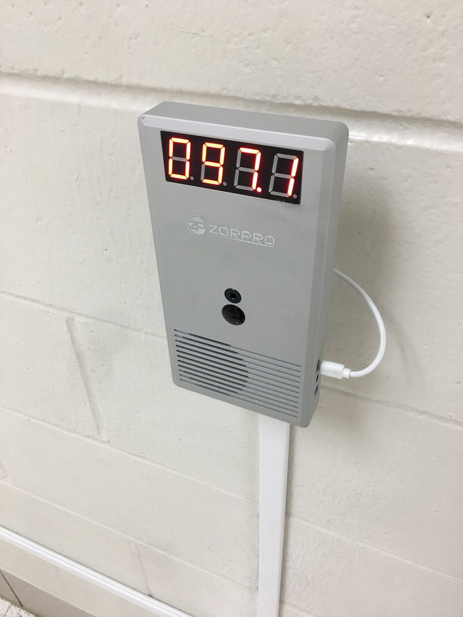 LTLions's tweet photo. Sign of the times. Temp gauge, water fountain changes, signs on the floor, and empty gym in the morning. We got this! #NewNormal #GoLoneTree #GoLions https://t.co/nHTN7DfGqB