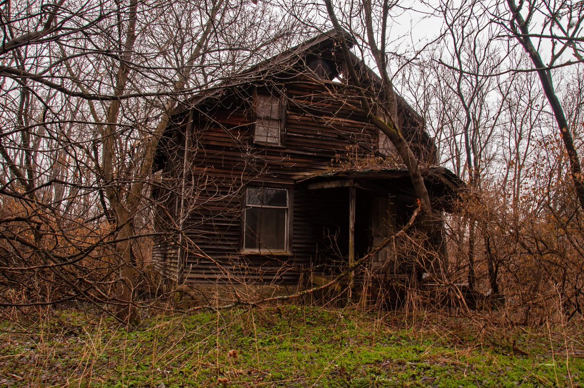 "Resiliency" 
   This abandoned home has some amazing structure left in it.  Collapsed on one side but so sturdy the front door still opens square.  #abandoned #home #house #urban #exploration #explore #exploring #urbex #nikon #photography
