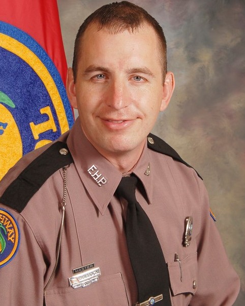 Trooper Joseph Bullock was shot and killed on February 5th in Martin County, FL after assisting a man whose car had broken down. Trooper Bullock was doing paperwork in his cruiser after the tow truck arrived and the man walked up to his window and shot him.