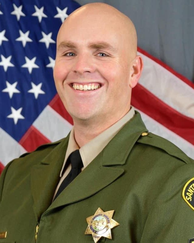 Sergeant Damon Gutzwiller was shot and killed on June 6th in Santa Cruz, CA while investigating a suspicious vehicle. After following the vehicle to a residence, the suspect got out and began firing.